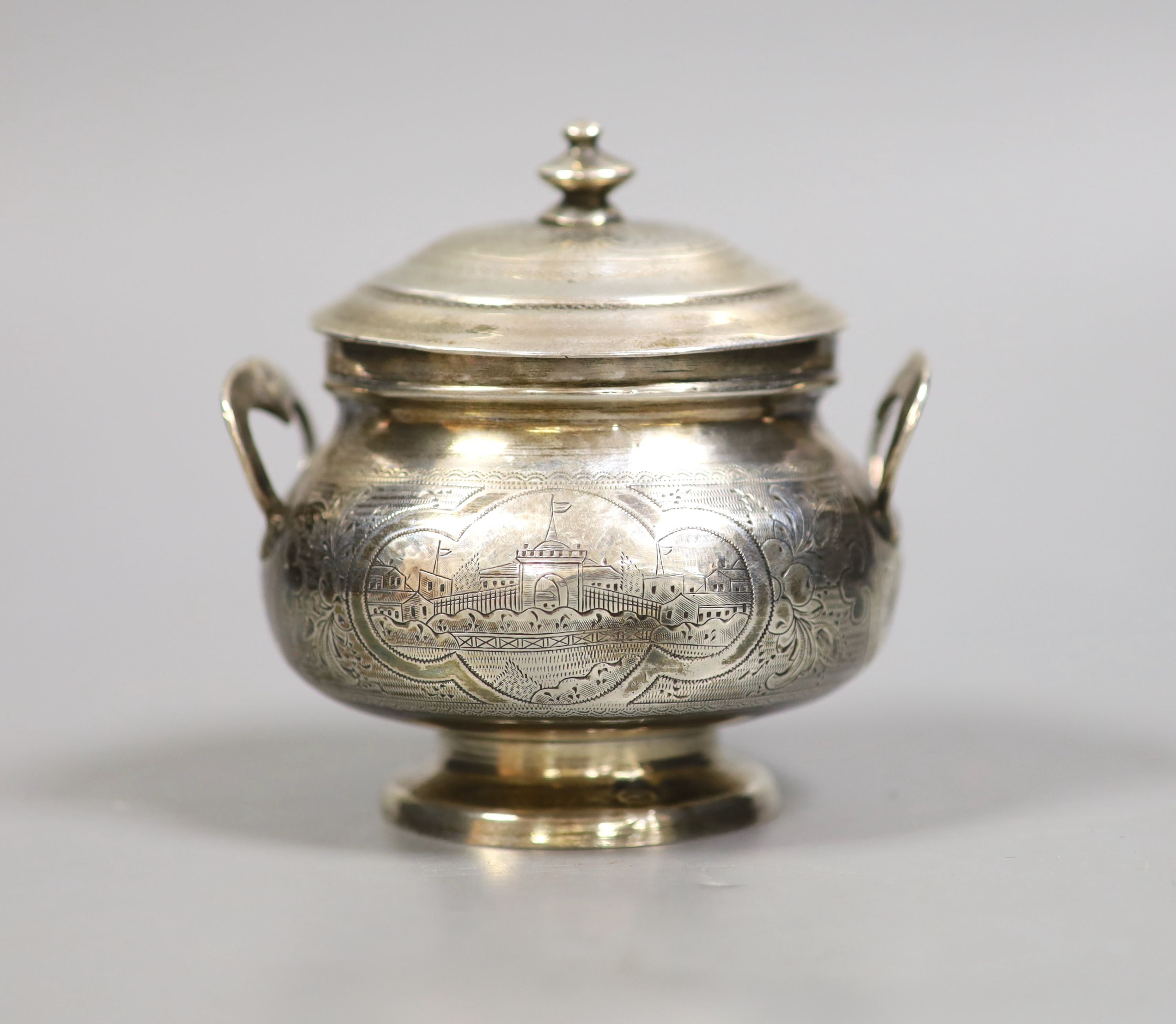 A late 19th century Russian 84 zolotnik engraved two handled pot and cover, assay master B.C, dated 1873, height 10cm, 7oz.